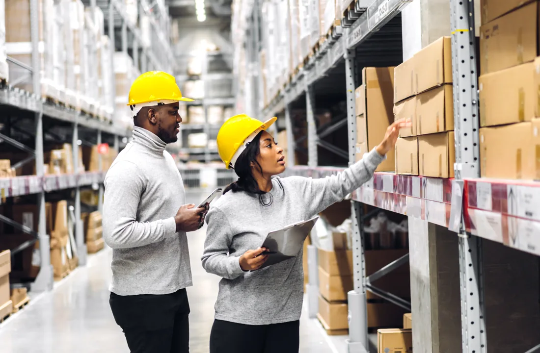 Warehouse colleagues checking inventory
